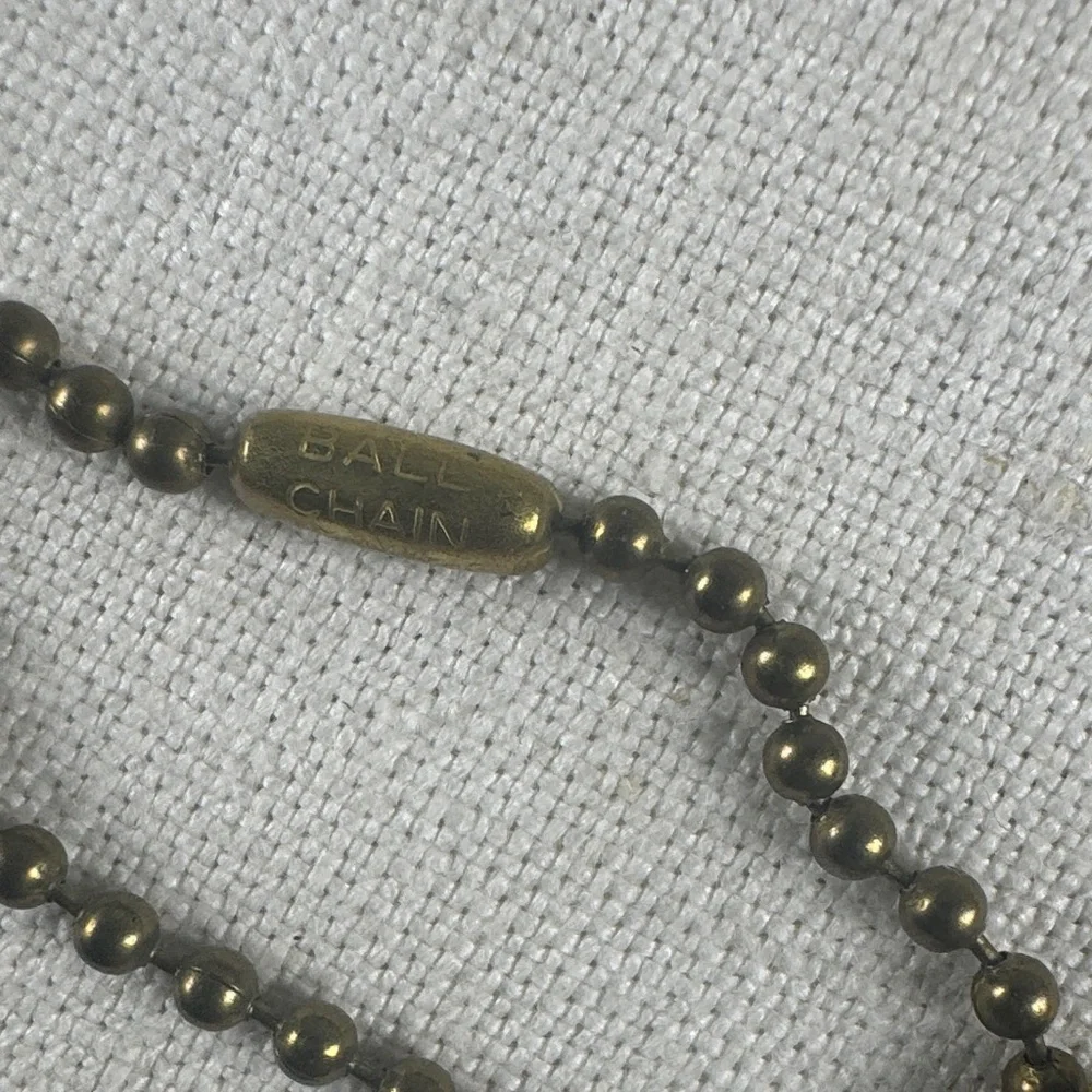 Letisse double sided gold bag charm tag